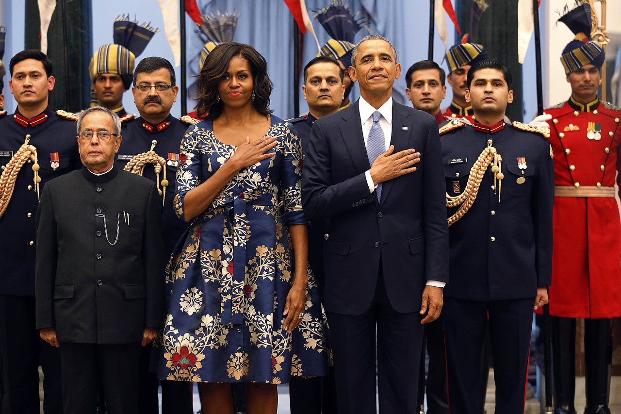 U.S. President Barack Obama and first lady Michelle Obama placed their hands over their hearts when the U.S. National Anthem was played before an official Indian State Dinner at the Rashtrapati Bhavan presidential palace in New Delhi on Sunday.